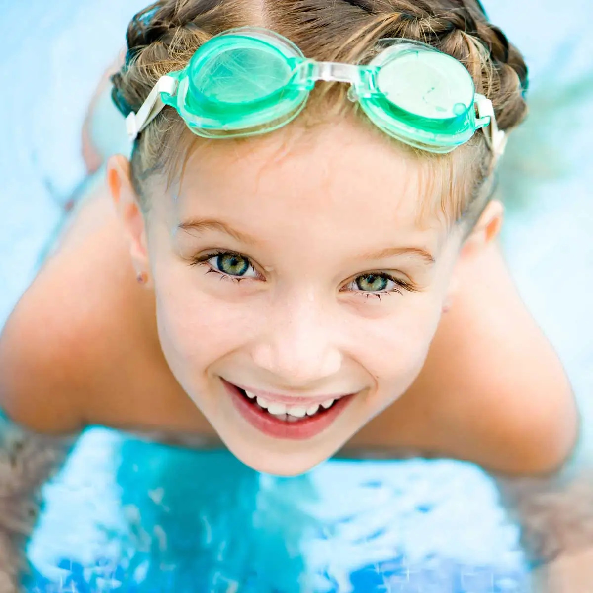 Girl in Googles swimming at River Run